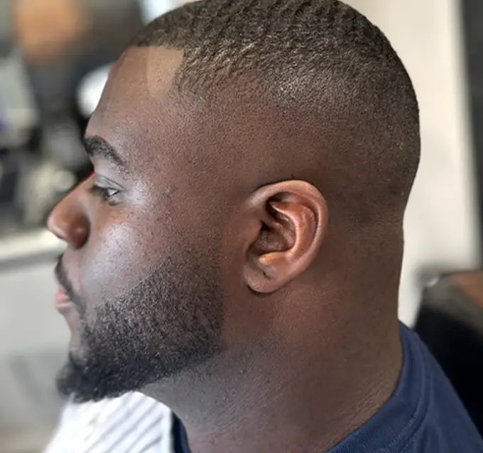 Beard grooming at Dino's Barbershop